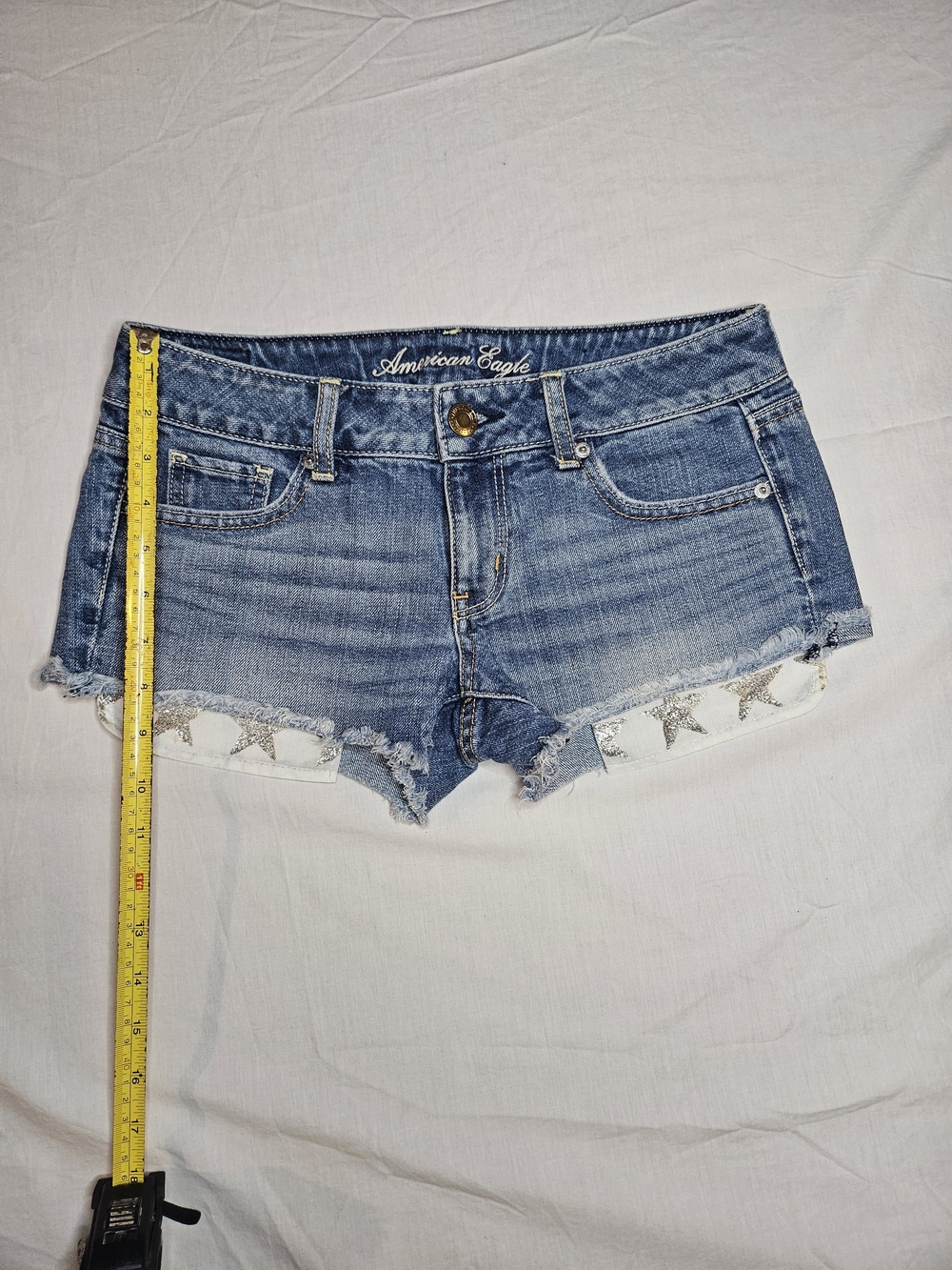 American Eagle Vintage Y2K Light Blue Distressed Denim Star-Trim Shorts